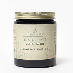 Coffee scrub jar with gold lid and brown label, "little buddha" text visible on label