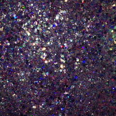 Close-up of iridescent lavender eyeshadow with shimmering glitter particles catching the light