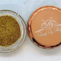 Glitter gold color in glass jar with copper lid, Beauty By Meli text visible