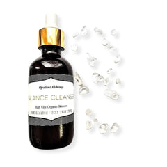 Balance cleanser bottle in black glass with gold cap and white label, Opulent Alchemy brand