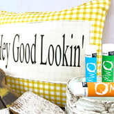 Lip balm tubes in blue, green, and orange with "O My!" text, SPF label