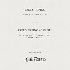 Close-up of three delicate wildflower temporary tattoos with gold foil detailing, arranged on skincare packaging