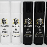 Wedding lip balm tubes in white and black with skull and text design for favors