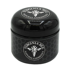 Side view of Virginia Bee cream in sleek white jar with gold accents, showcasing rich texture and minimalist branding