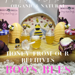 Lip balm jars with yellow liquid, glass and bee-shaped toppers, Boo's Bees branding
