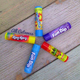 Flavored lip balm tubes in various colors with brand names on a wooden surface