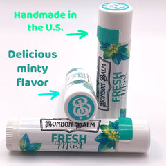 Lip balm tubes with white and teal design, Bonbon Balm brand, Fresh Mint flavor