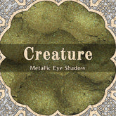 Eye shadow, olive green metallic, Creature brand, decorative border