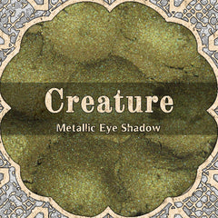 Eye shadow, olive green metallic, Creature brand, decorative border