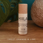 Lip balm tube with brown and white paper, HIILA branding, and Sweet Orange & Lime text