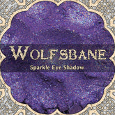 Eye shadow with purple sparkle, WOLFSBANE text, and decorative border