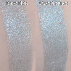 Swatches of shimmering silver pigment on skin, with "Bare Skin" and "Over Primer" text visible
