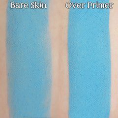 Blue swatch comparison on skin, showing texture and color difference between bare skin and primer application