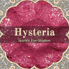 Vibrant hot pink loose powder eye shadow with sparkling shimmer in a small round jar