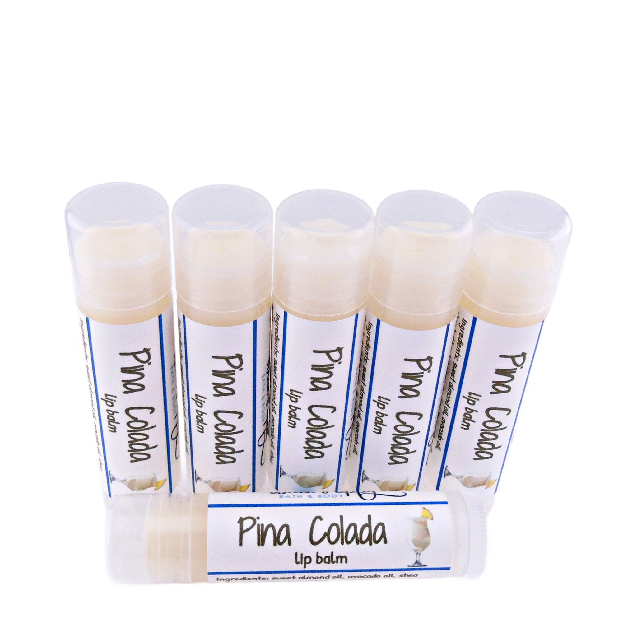 Lip balm tubes with white and blue labels, clear caps, and Pina Colada text and image