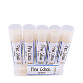 Lip balm tubes with white and blue labels, clear caps, and Pina Colada text and image