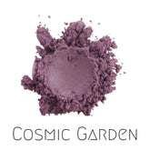 Vegan mineral eyeshadow pot in cosmic garden shade, showcasing vibrant purple duochrome shimmer with eco-friendly packaging