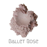 Handmade vegan mineral eyeshadow in ballet rose, a sheer pale pink powder in a compact case.