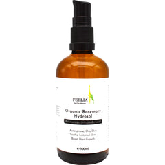Rosemary Hydrosol bottle, amber glass, black pump top, white label with text