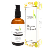 Toner bottle with brown glass, black pump, and Feelia label on white box with floral pattern