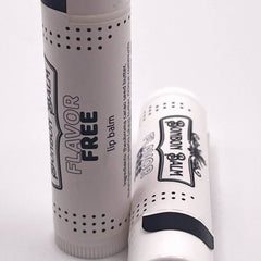 Lip balm tubes with white and black labels, dotted pattern, and "BONBON BALM" text visible