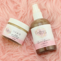 Face moisturizer and cleanser set with white and pink labels on pink fur background, Goddess in Her G brand