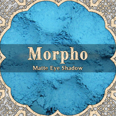 Matte eyeshadow, light cyan blue powder, Morpho brand text, decorative border