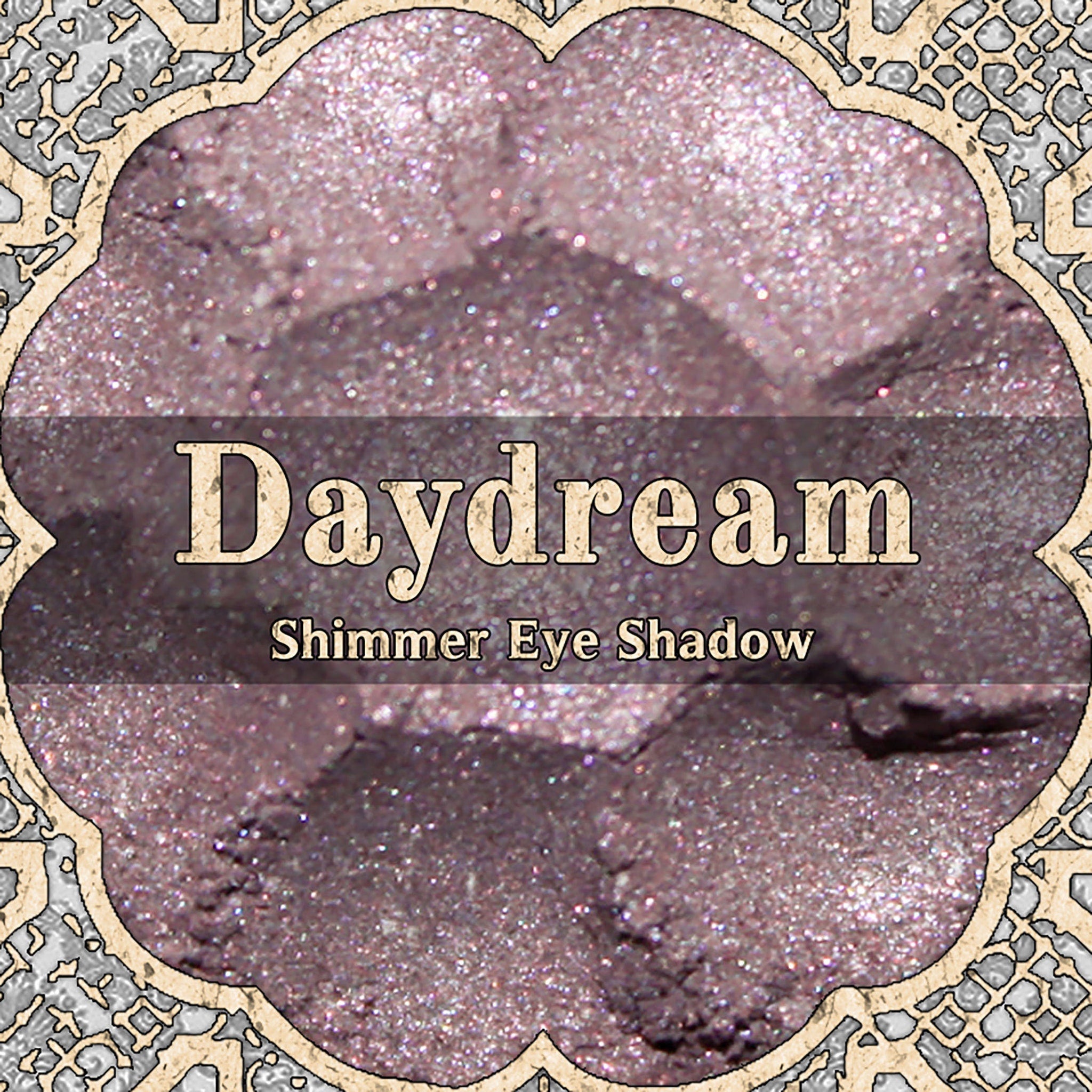 Shimmer eye shadow pale pink with DAYDREAM text in decorative frame