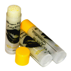 Lip balm tubes with yellow caps, white tubes, and black lip graphic, BANANA Sugar Kiss label