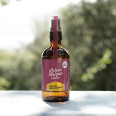 Toning lotion bottle, brown glass, purple label, with Nouvelle Herboristerie text and red seal