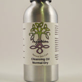 Cleansing oil bottle, silver metal, white label with Infusion logo and text Normal-Dry