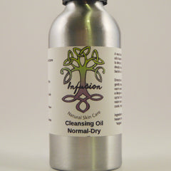 Cleansing oil bottle, silver metal, white label with Infusion logo and text Normal-Dry