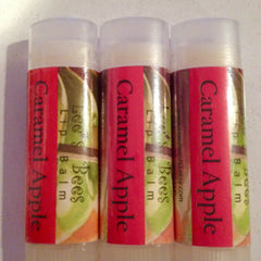 Lip balm tubes with red labels, clear caps, and "Caramel Apple" text