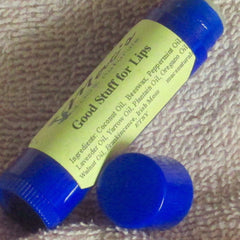 Lip balm tube with blue plastic, yellow label, and text "Good Stuff for Lips