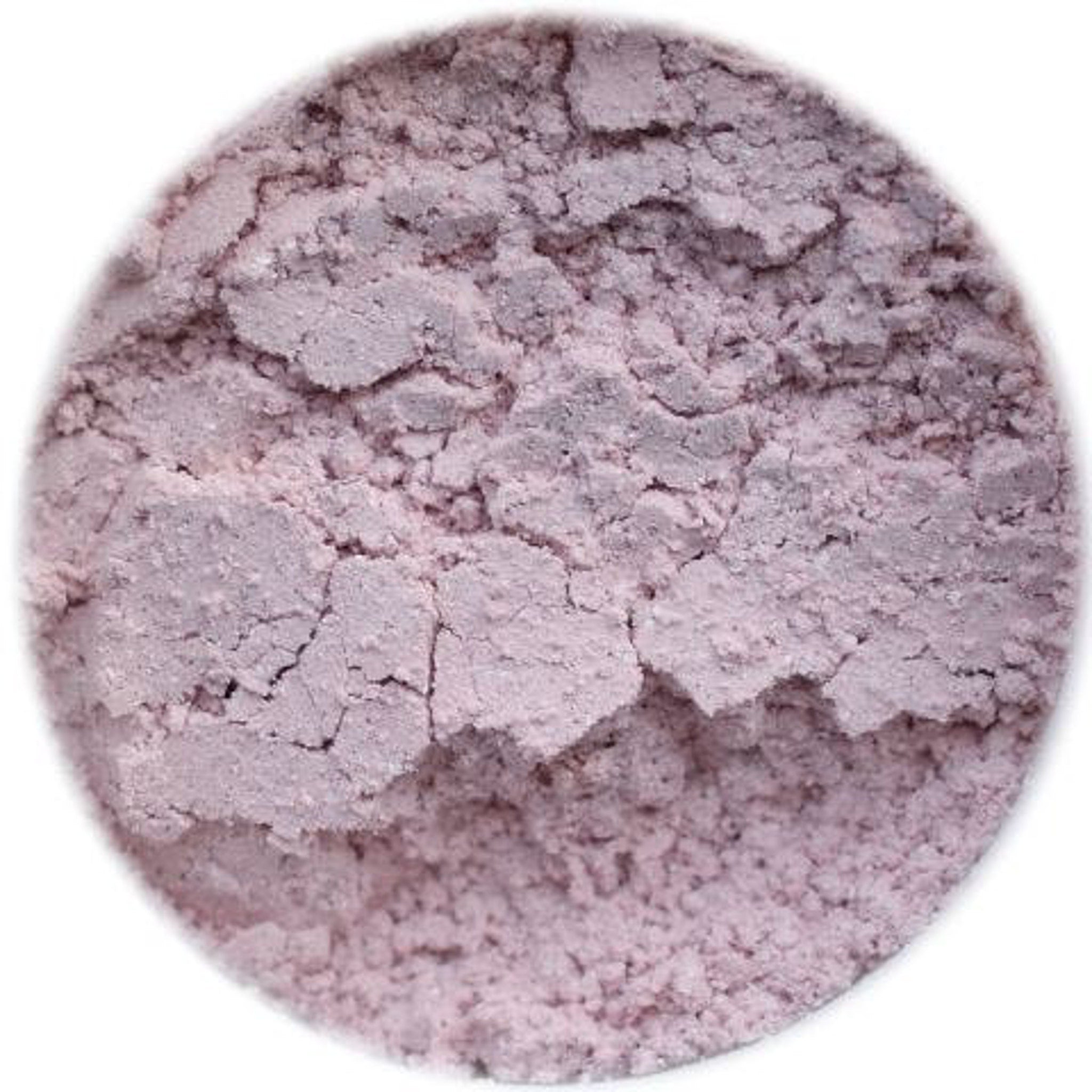Single matte baby pink eyeshadow pan with smooth texture in minimalist round compact