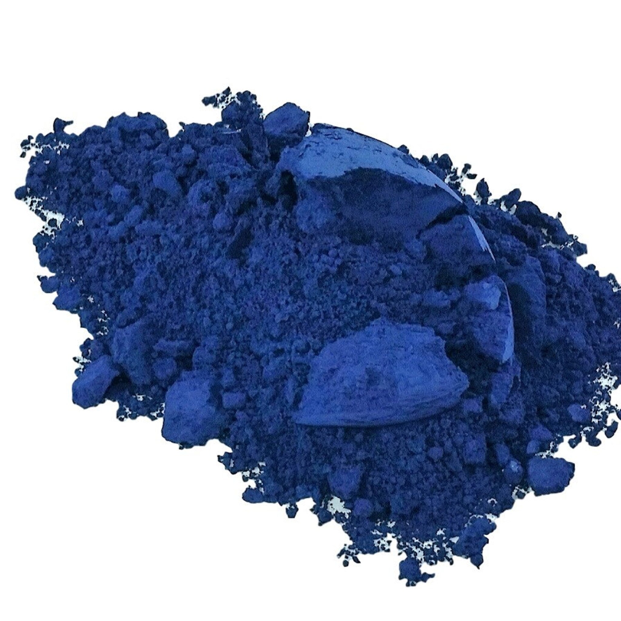 Open compact showing pressed periwinkle and cornflower blue eye shadow with mirrored interior.