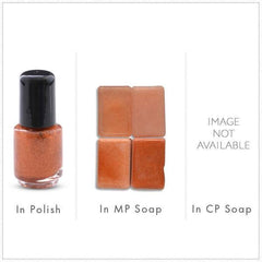 Close-up of shimmering copper gold brown mica pigment powder with metallic finish in cosmetic jar