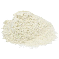 Close-up of sparkling white mica pigment powder with shimmering particles in a cosmetic jar