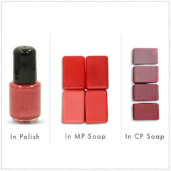 Close-up of shimmering raspberry pink mica eyeshadow powder with red undertones and metallic finish