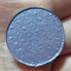 Moonlight Masquerade Eye Shadow palette with shimmering silver, deep navy, and matte black shades in sleek black compact
