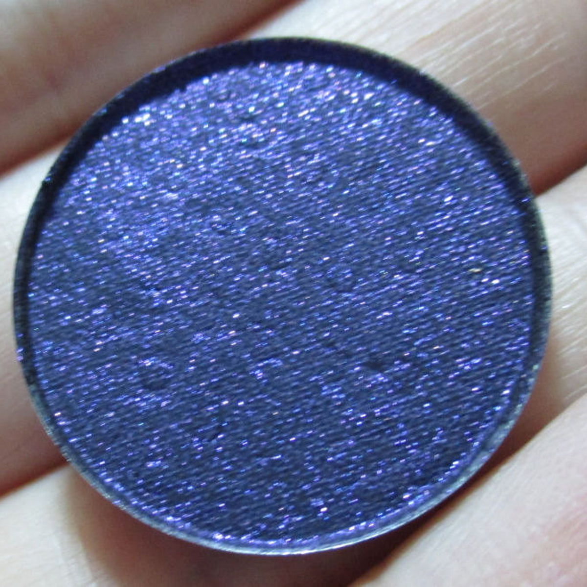 Flashdance Eye Shadow Palette featuring 12 vibrant matte and shimmer shades in sleek black compact