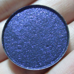 Flashdance Eye Shadow Palette featuring 12 vibrant matte and shimmer shades in sleek black compact