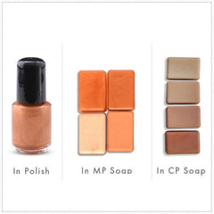 Nail polish bottle with black cap, bronze liquid, and soap samples in various shades of brown