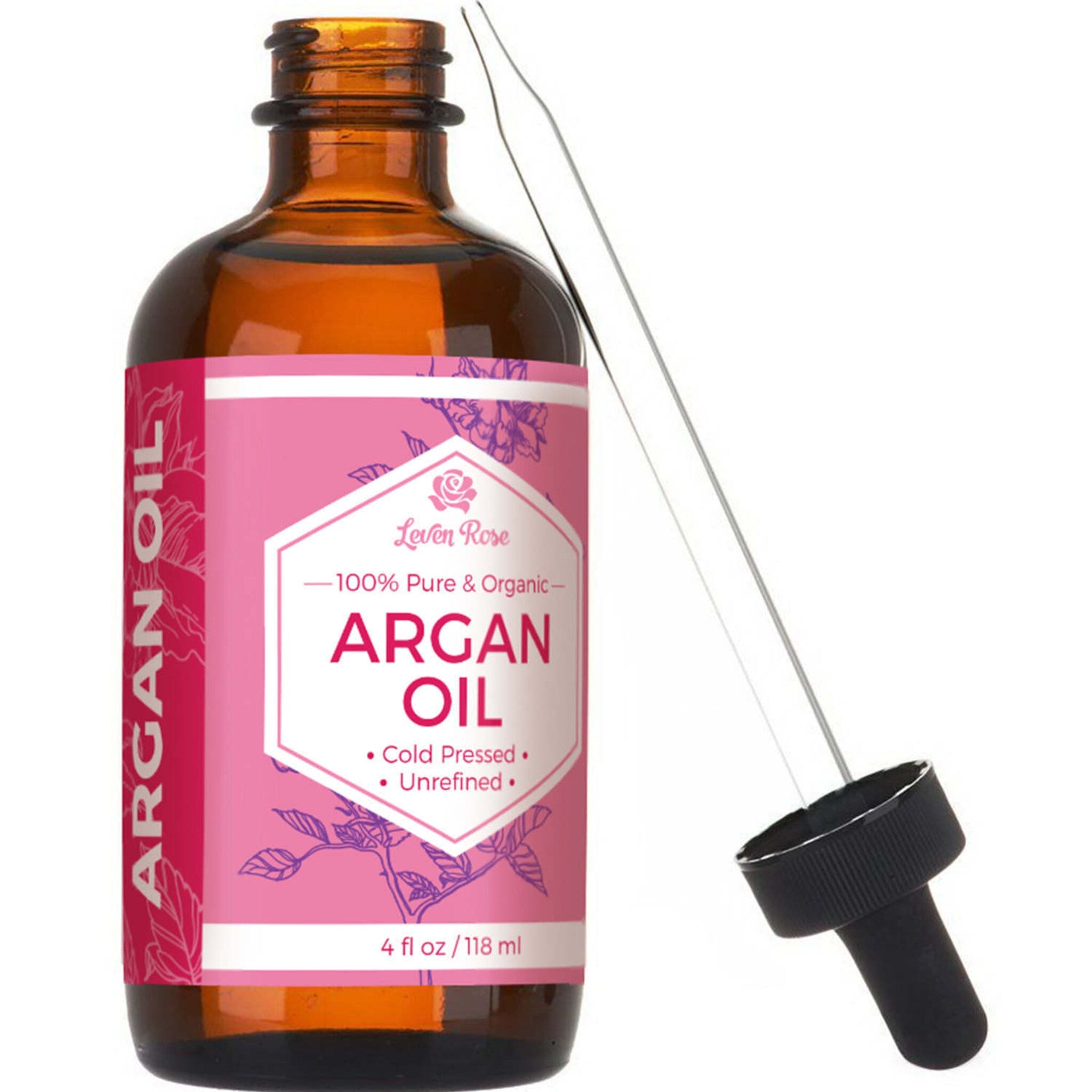 Golden amber argan oil glistening in sunlight, showcasing its pure, cold-pressed texture in a clear glass dropper bottle.