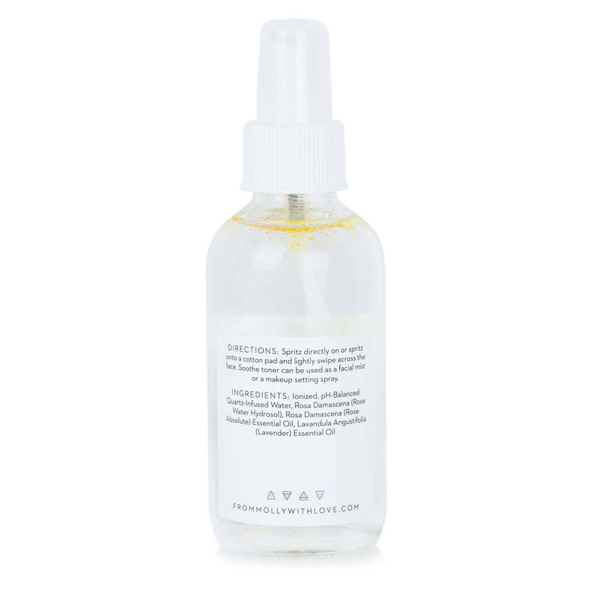 Facial mist spray bottle, clear glass, white cap, From Molly With Love label visible