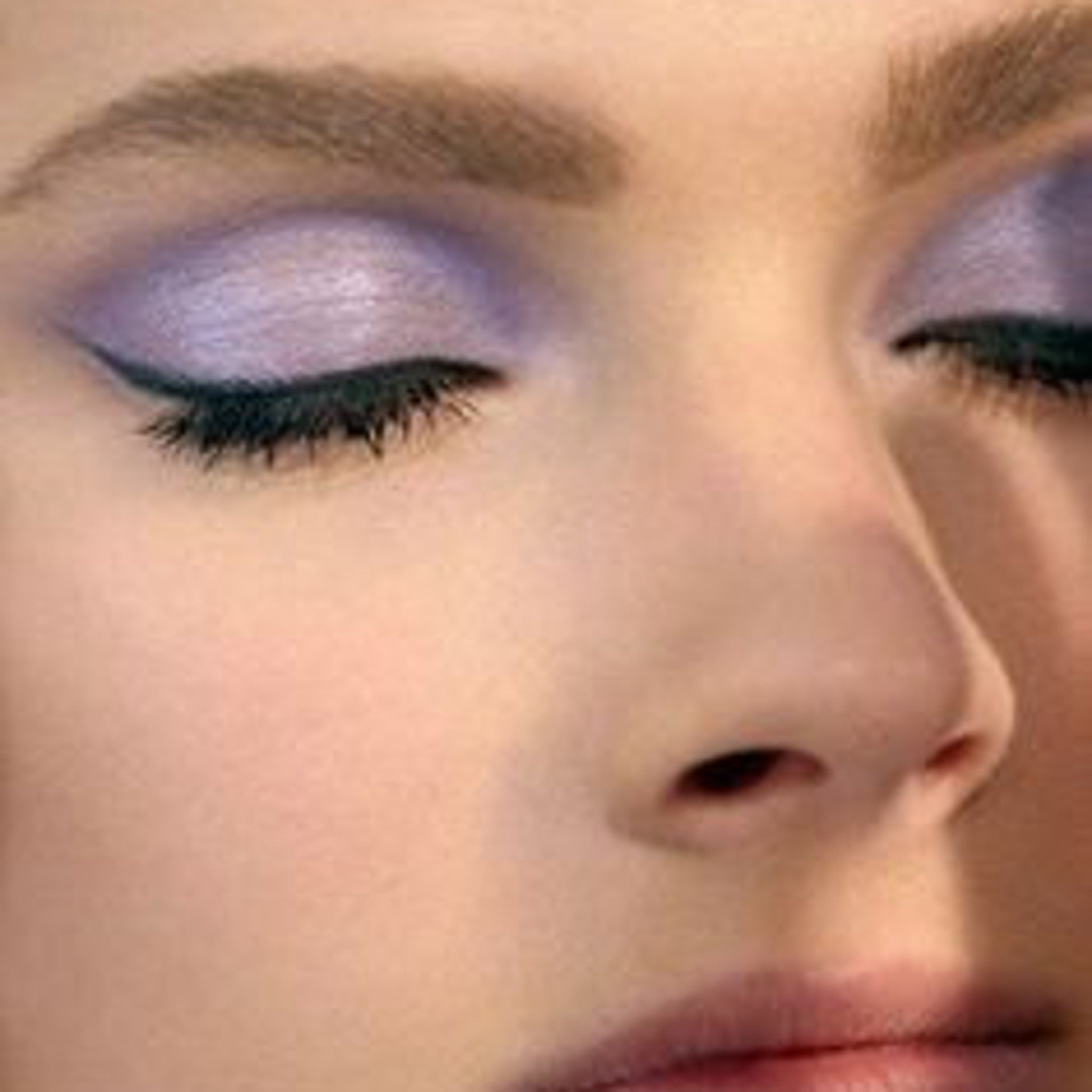 Amethyst Moon eye shadow pot with pastel purple lavender powder visible inside sleek black compact