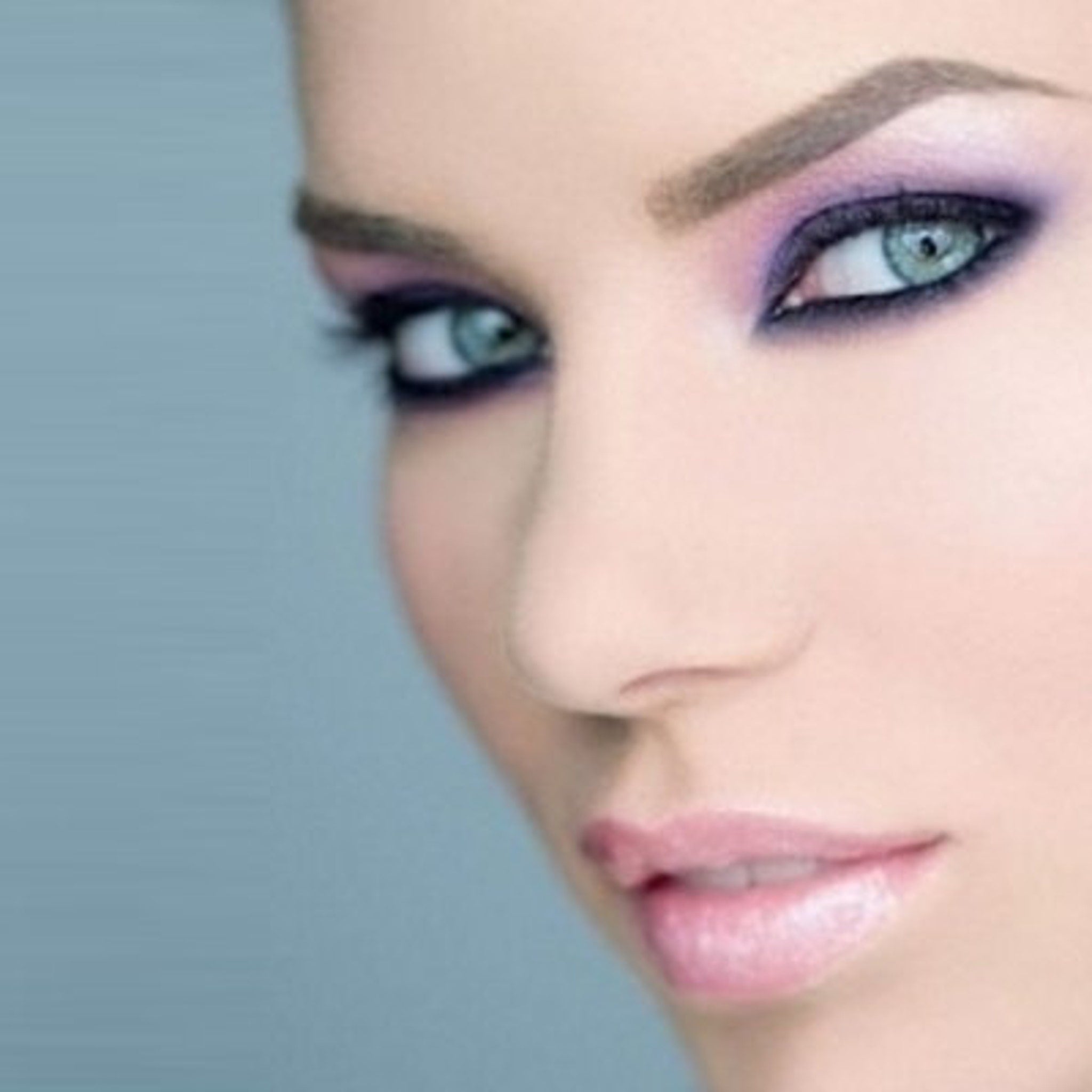 Close-up swatch of Amethyst Moon pastel lavender eyeshadow with soft shimmer on fingertip
