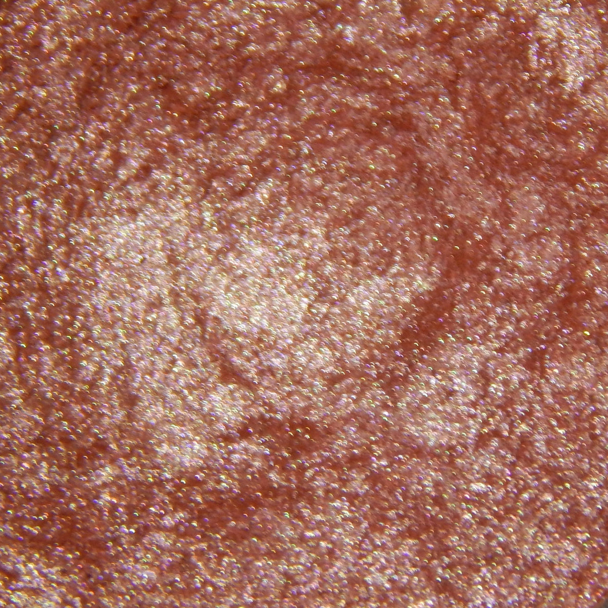 Single pan of Peach Drift eyeshadow with soft matte finish in warm peachy-pink tone