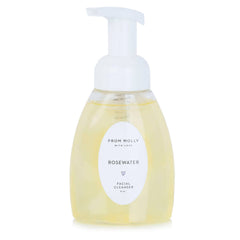 Facial cleanser bottle with white pump, clear liquid, and white label with "From Molly With Love" text