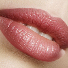 Lip color, pink gloss, close-up of lips with visible texture and white teeth